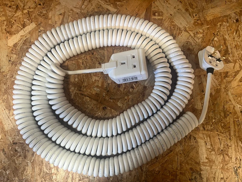 1-way White or Black LSZH Coiled Power Extension lead