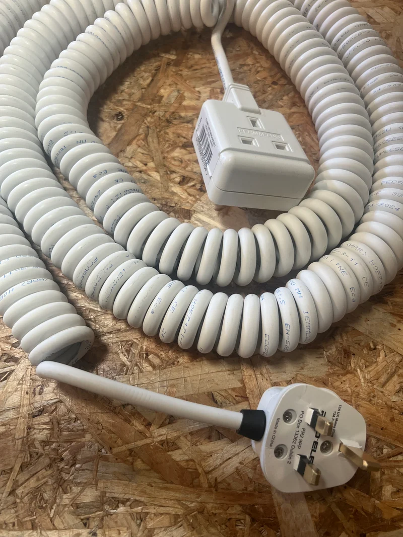 1-way White or Black LSZH Coiled Power Extension lead